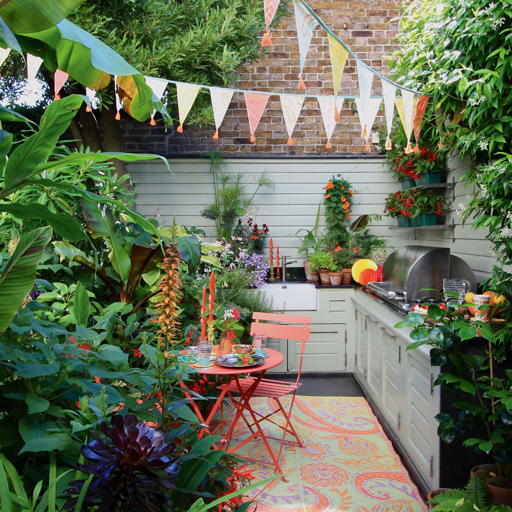 Outdoor kitchen in small garden