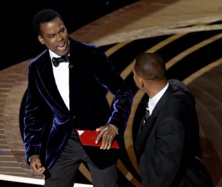 Will Smith and Chris Rock onstage during the 94th Annual Academy Awards