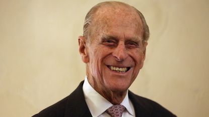 Prince Philip was missing a key coronation detail in a throwback photo. Seen here he officially opens the new Cellarium café