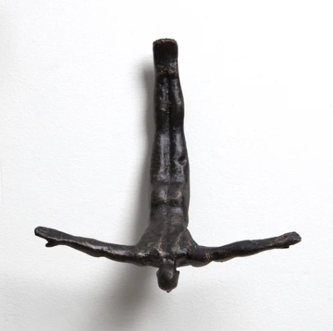 Diving figure wall art.