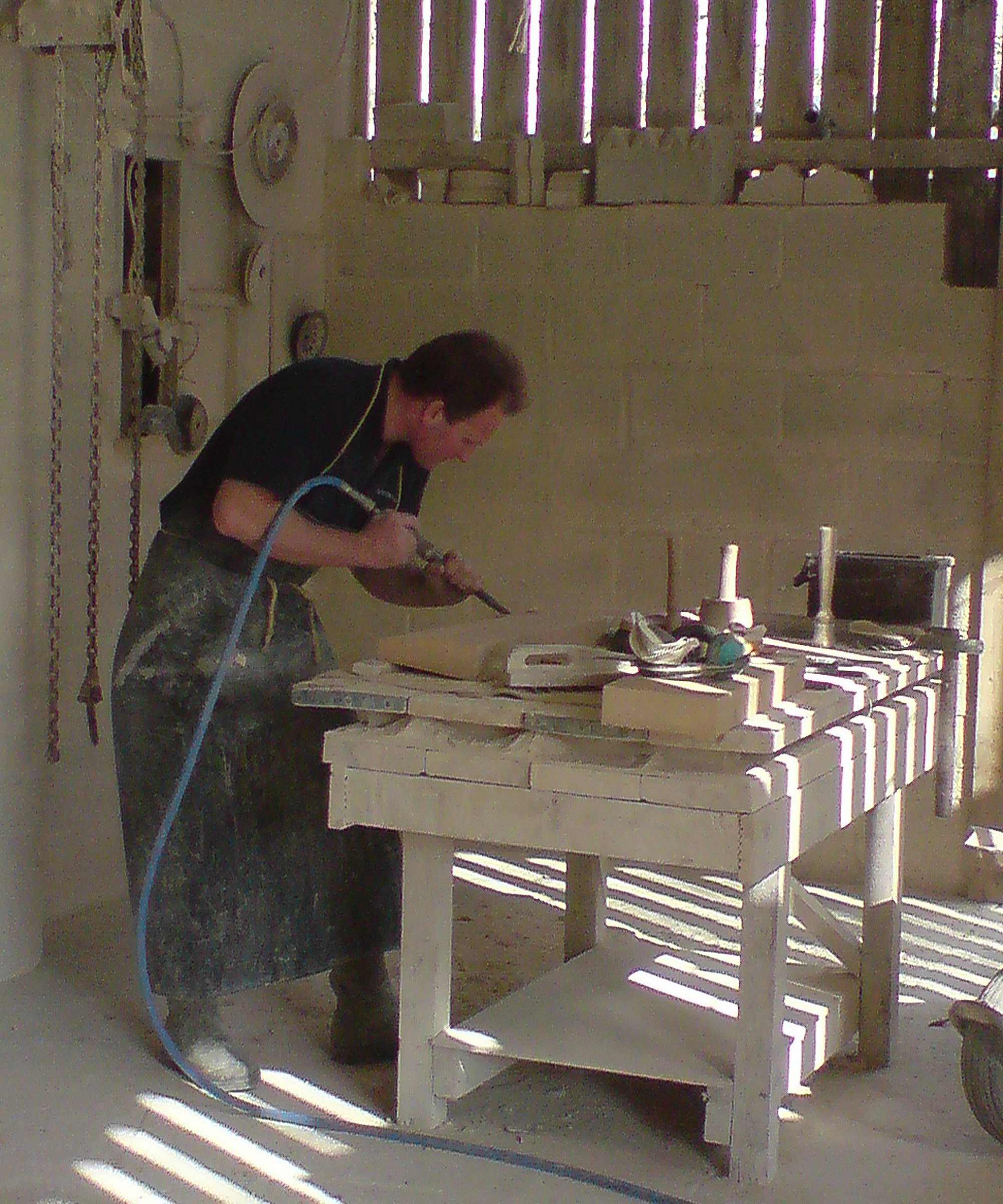 stonemason carving bath stone