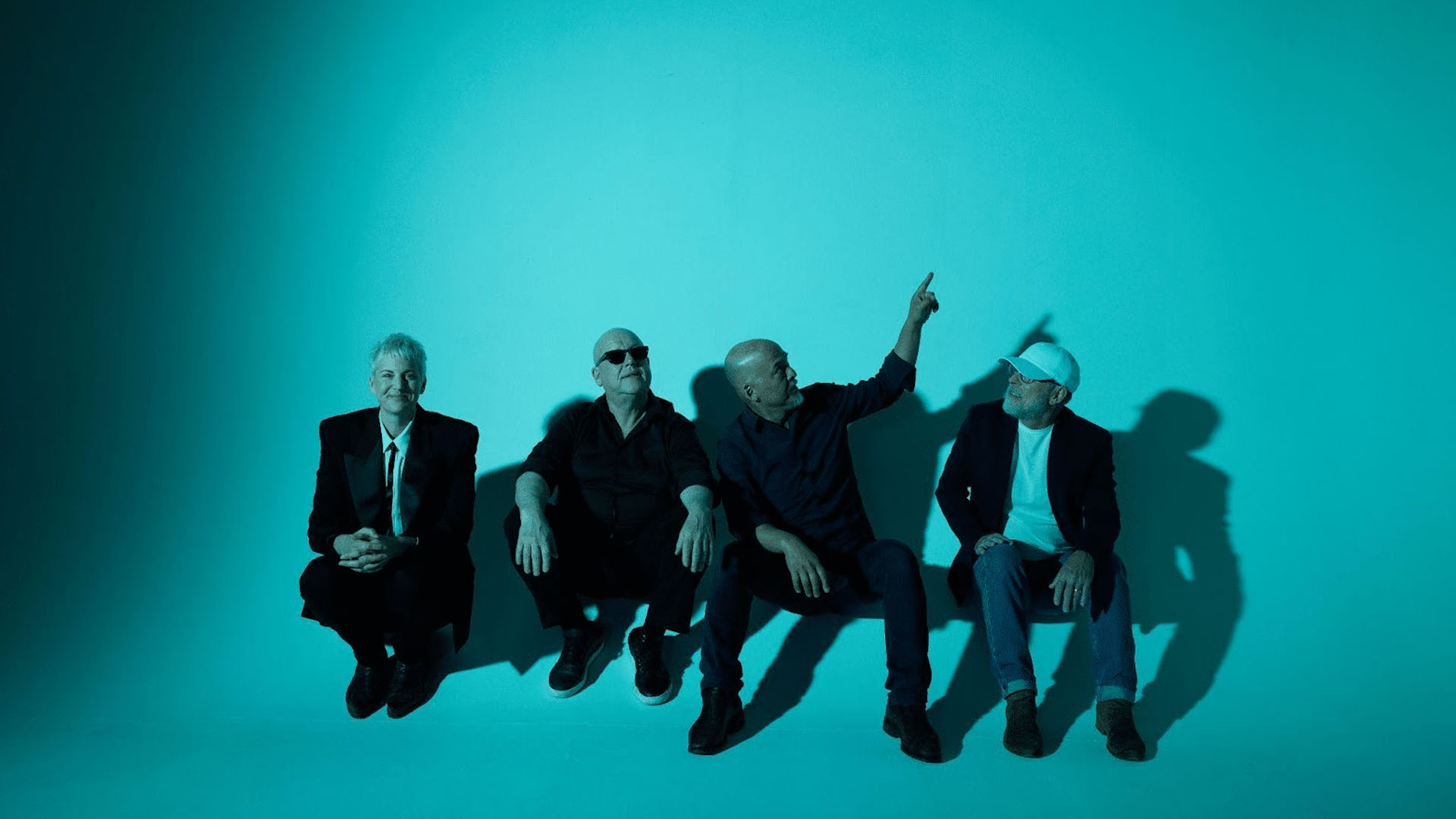 Photo of the band members of Pixies.