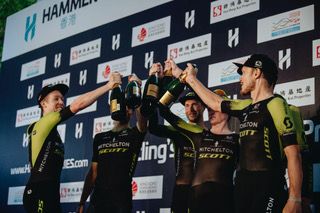 The Mitchelton-Scott team celebrate winning the Hammer Hong Kong race