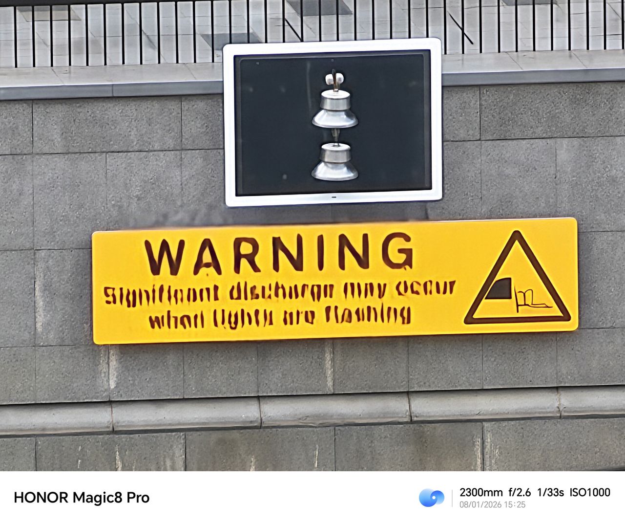 Honor Magic 8 Pro camera sample warning sign 100x zoom