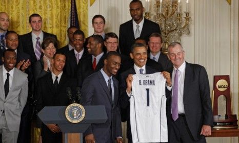 President Obama poses with the 2011 NCAA Champion University of Connecticut team: The NCAA is vowing major changes to college sports&amp;#039; rules but critics are doubtful.