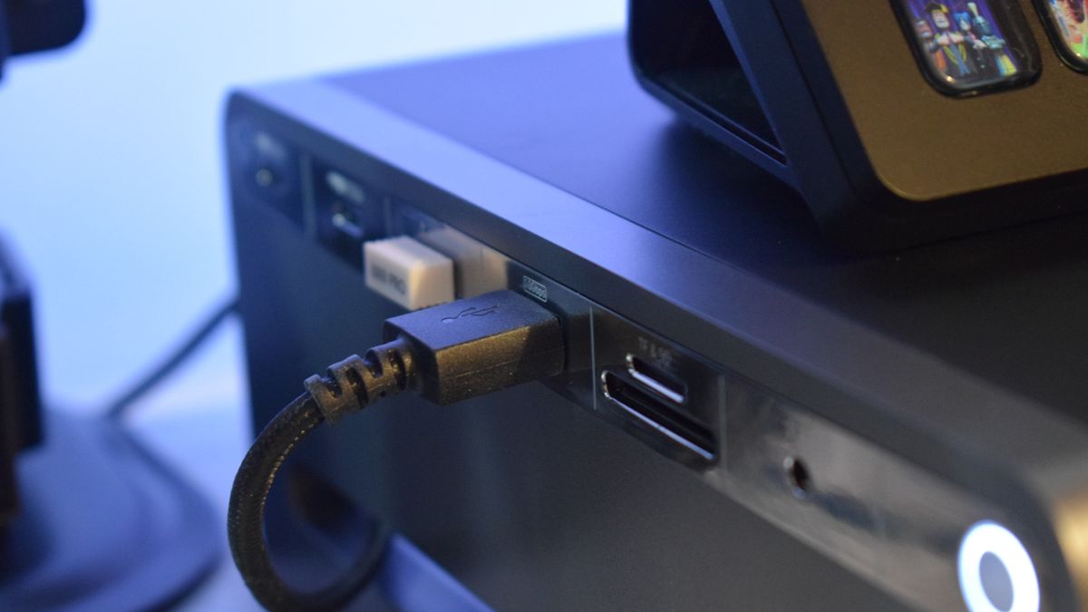 Close-up photo of the Anker 675 USB-C Docking Station's left-hand ports with a Stream Deck sitting on its surface.