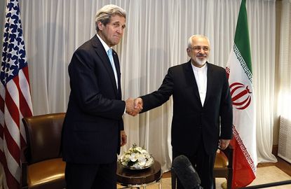 Secretary of State John Kerry shakes hands with Iran's foreign minister during nuclear talks.