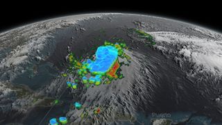 This scientific visualization shows a 3D side view of Hurricane Joaquin in action.