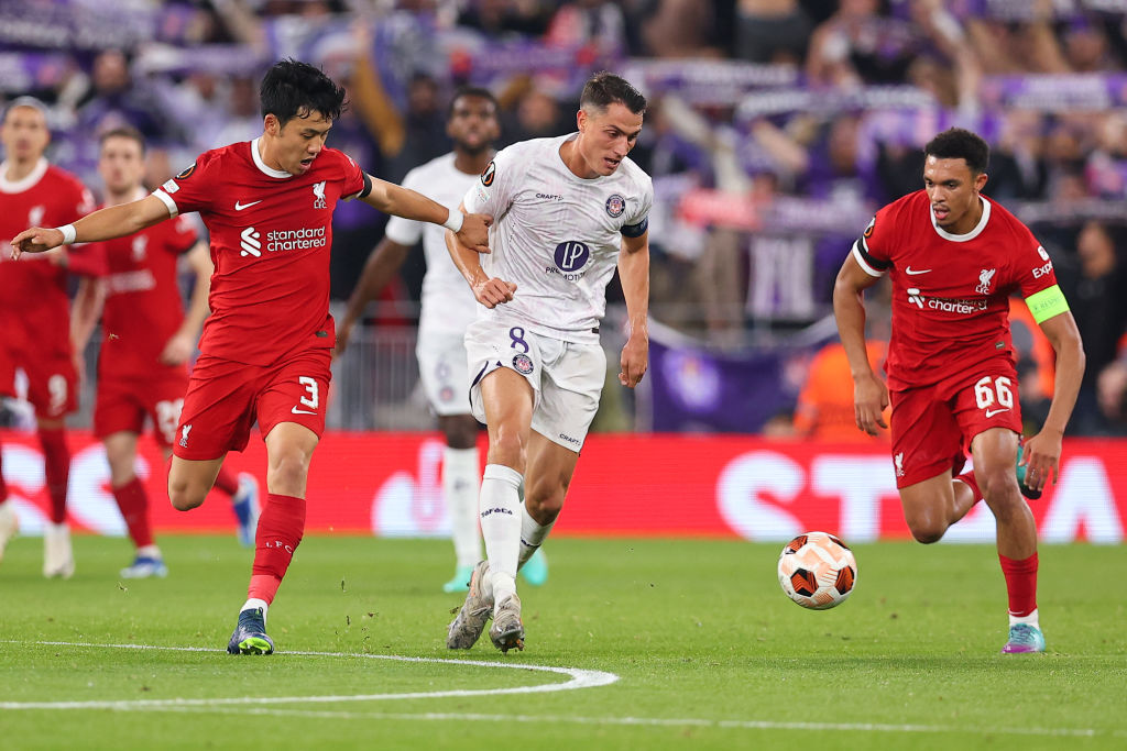 Wataru Endo of Liverpool FC and Trent Alexander-Arnold of Liverpool FC attempt to dispossess Vincent Sierro of Toulouse FC during the UEFA Europa League 2023/24 match between Liverpool FC and Toulouse FC at Anfield on October 26, 2023 in Liverpool, England. (Photo by Ryan Crockett/DeFodi Images via Getty Images)