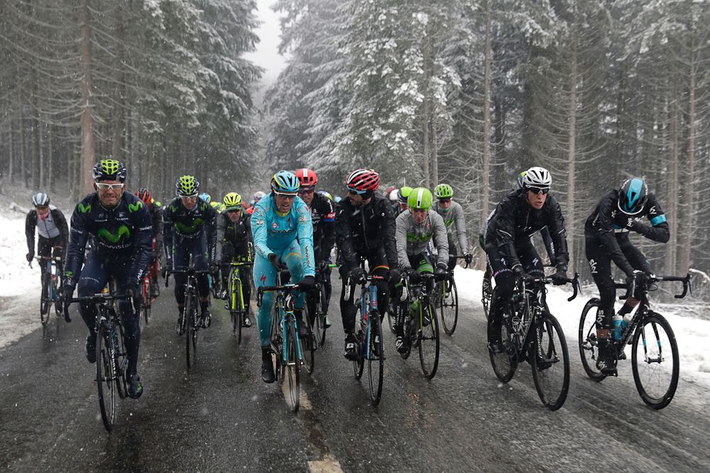 Pack rides under the snow during the third stage of the 74th edition of the Paris-Nice