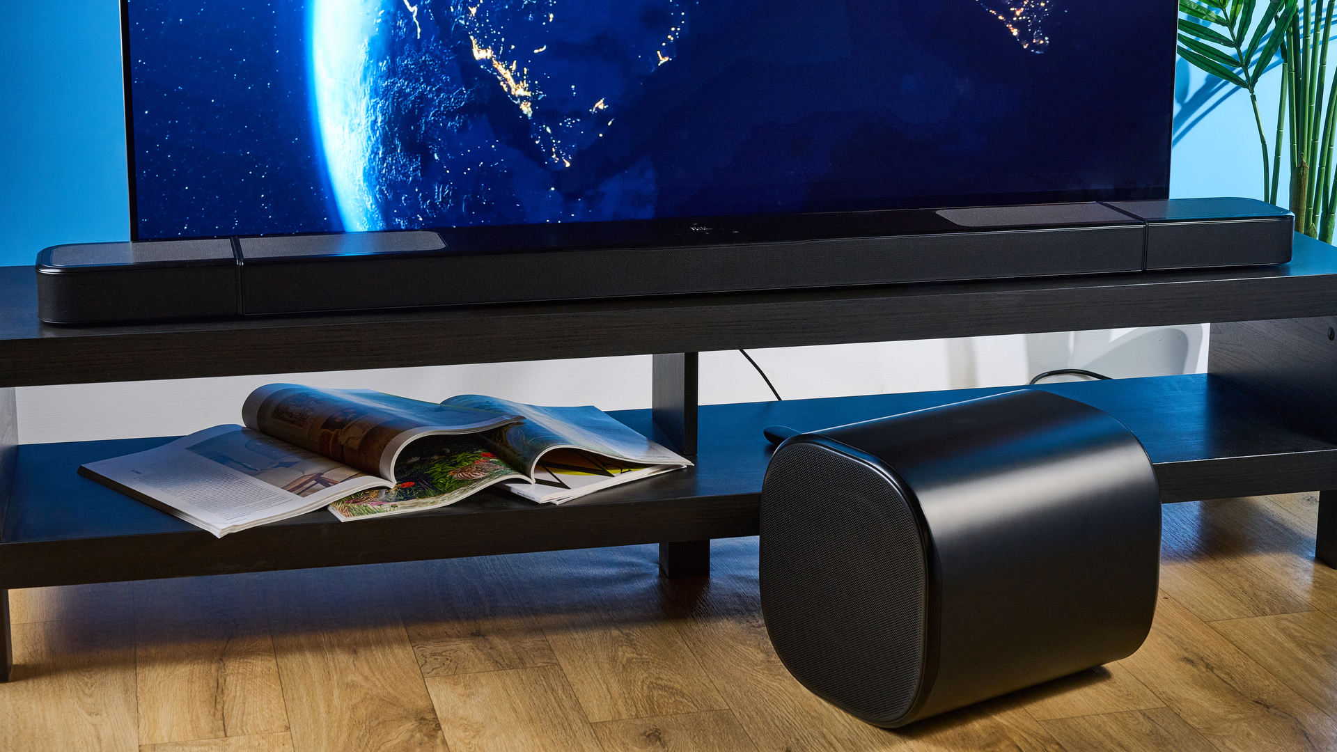 the jbl bar 1300xmk2 in black photographed against the blue tom's guide background