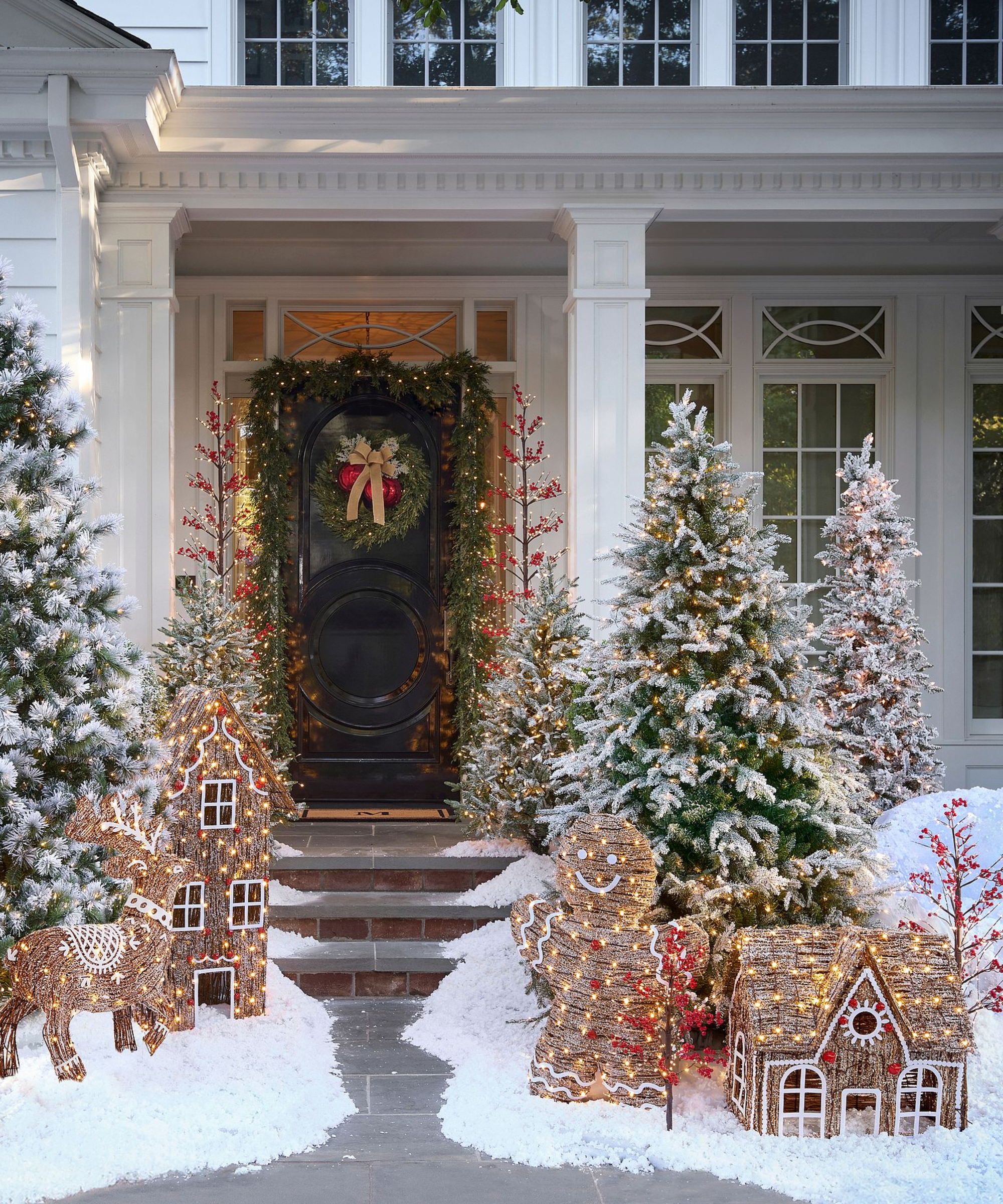 a porch decorated for Christmas
