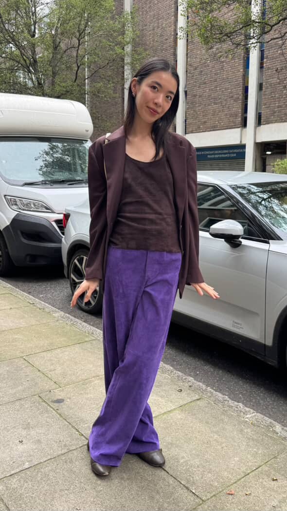 zoe suen wears a stouls suede tank and trousers