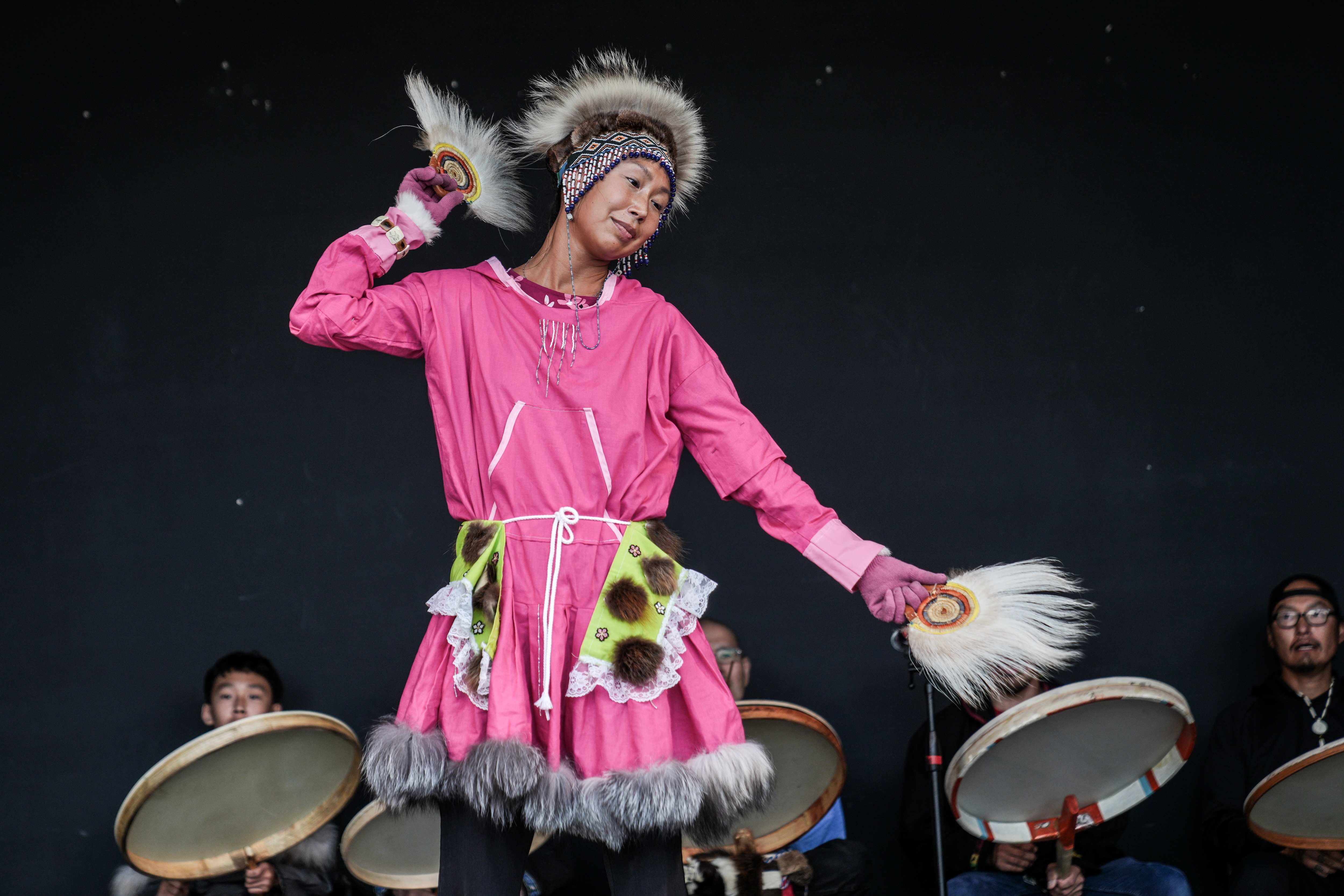 A native Alaskan performs at the Alaska State Fair