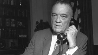 J Edgar Hoover on the phone