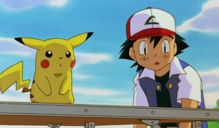 Pokemon: The First Movie Pikachu and Ash look at something in shock