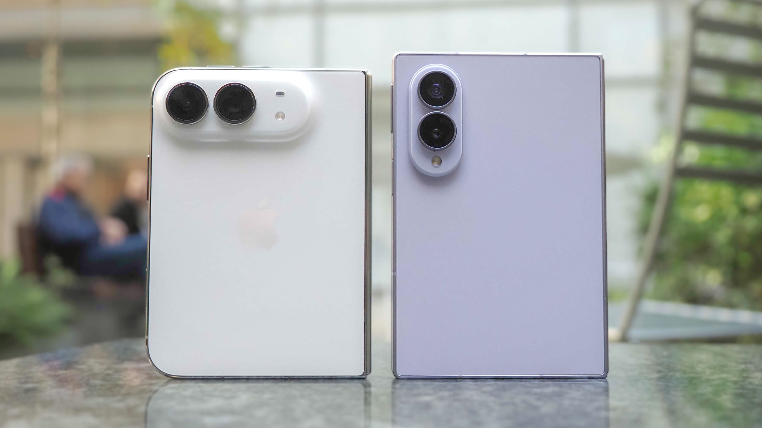 iPhone Duo vs. Galaxy Z Fold 8 held in the hand.