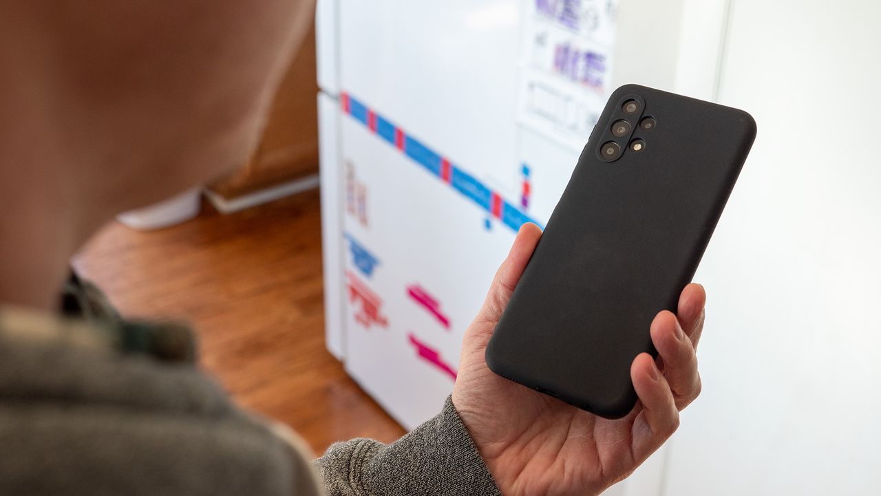 The Bark Phone, a Samsung Galaxy A13 with a custom OS, in a case