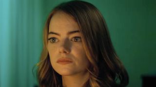 Emma Stone as Mia looking upset after her fight with Sebastian in La La Land.