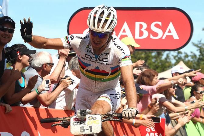 Nino Schurter and Philip Buys (unsighted) of SCOTT-Odlo MTB Racing celebrates finishing second during stage 5