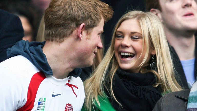Photo shows Prince Harry and his girlfriend Chelsy Davy laughing before the Investec Challenge international rugby match South Africa vs. England in Twickenham, west London, on November 22, 2008