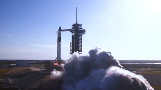 SpaceX test fired the first stage of the Falcon 9 rocket carrying its first Crew Dragon spacecraft on Jan. 24, 2019 at Launch Pad 39A of NASA's Kennedy Space Center in Cape Canaveral, Florida. The rocket is scheduled to launch the Demo-1 test flight in February.