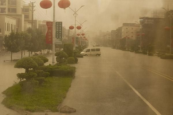 Some of the roads along the race route were again flooded after torrential rain hit the countryside in Hainan.
