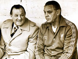 Liverpool manager Bob Paisley and assistant manager Joe Fagan on the bench during a First Division match against Tottenham, 1979