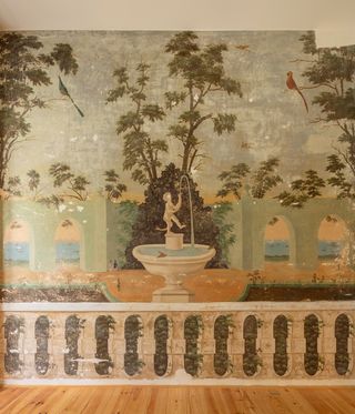 Fresco inside restored Lisbon apartment at Antiga Casa Pessoa