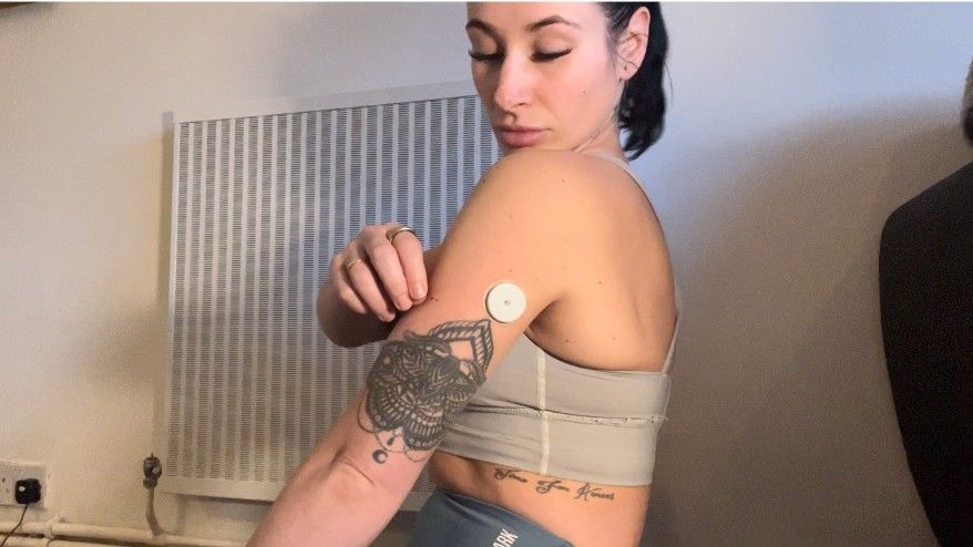 Writer Sam wearing the Levels Health glucose monitor