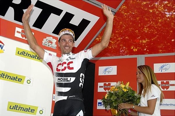 Switzerland's Fabian Cancellara (Team CSC) waves to the crowd.