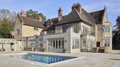 A grand country house with a swimming pool