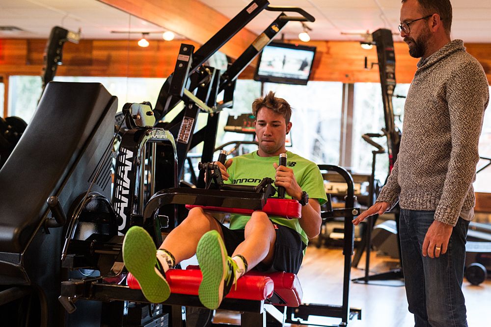 Jonathan Vaughters supervises some hamstring strengthening exercises