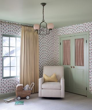 child's nursery with tulip wallpaper