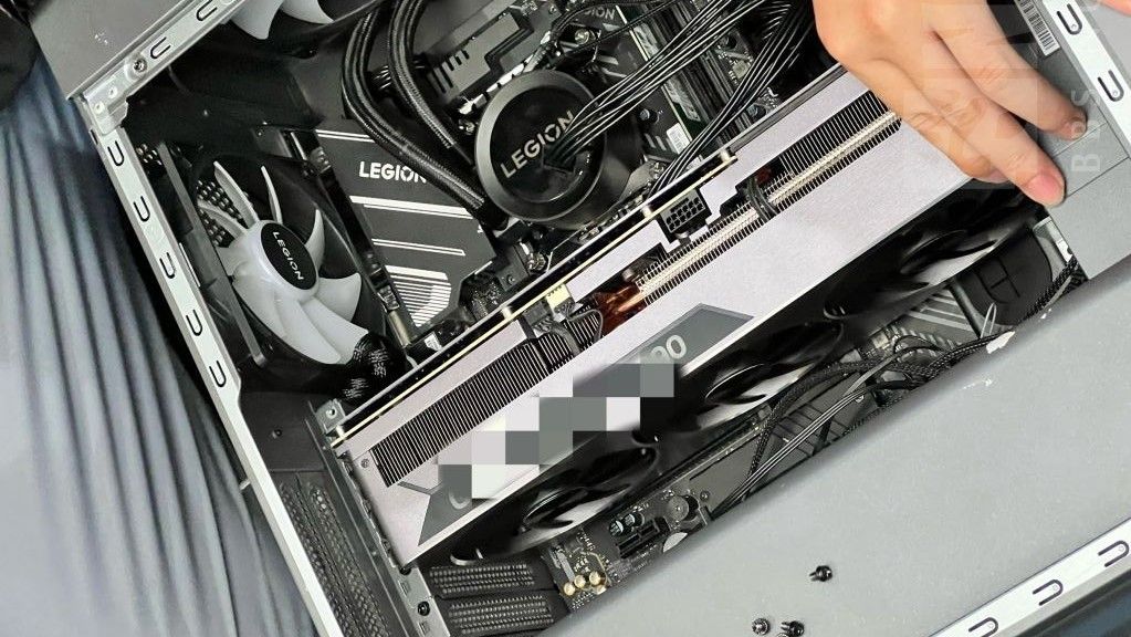 Suspected Lenovo Legion RTX 4090 graphics card pictured inside a Legion-branded PC case with other components.