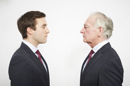Son and father facing off