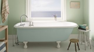 freestanding rolltop bath with eau de nil walls