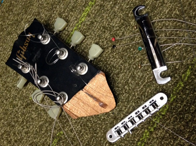 Broken Gibson headstock