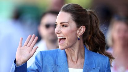 Kate Middleton waving to crowd