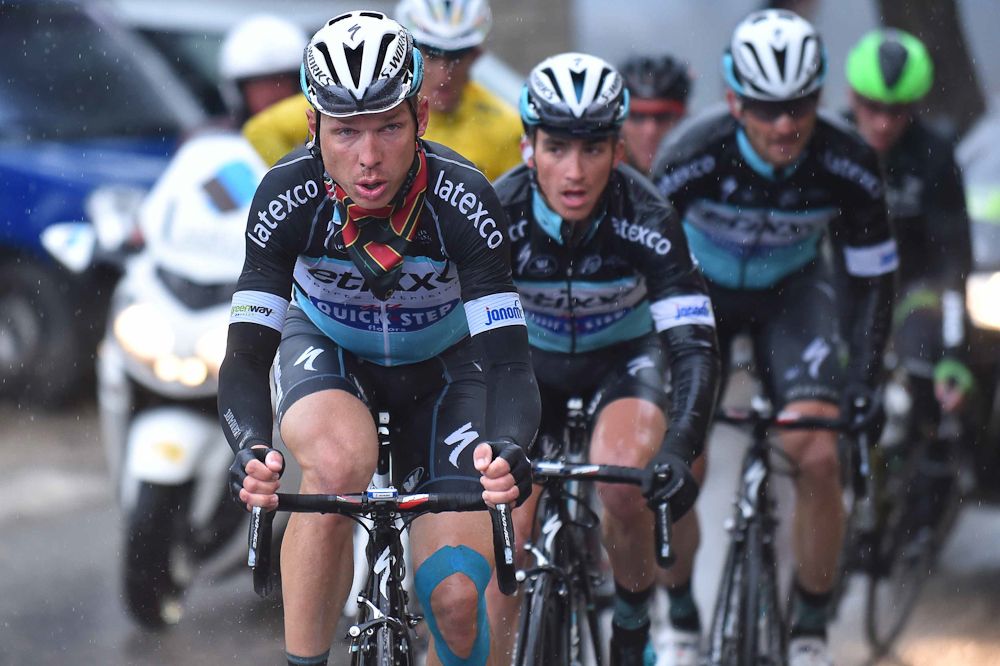 Tony Martin drives a late-race move by Etixx-QuickStep.
