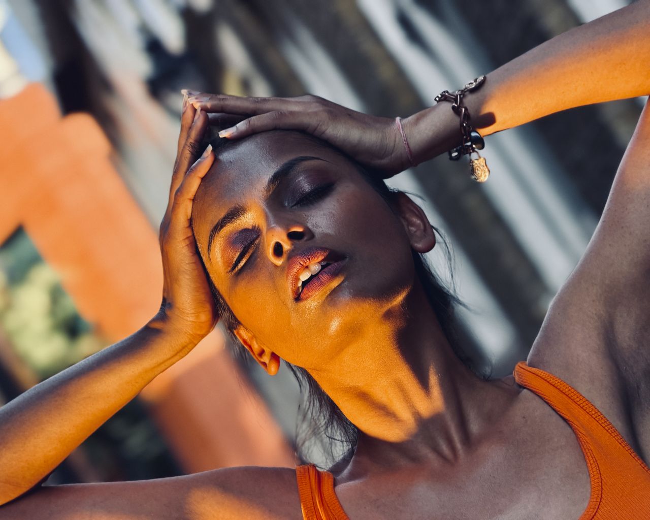 Example shot showing low-angle views of the dynamically posing model. The low side key light from the FS60B adds drama and gives the model a more three-dimensional look.