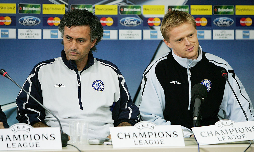 SEVILLA, SPAIN - OCTOBER 31: Jose Mourinho (L) the Chelsea coach and player Damien Duff talk to the media during Chelsea's preparation for tomorrow's UEFA Champions League group G match against Real Betis at the Ruiz de Lopera Stadium October 31, 2005 in Sevilla, Spain (Photo by Richard Heathcote/Getty Images)