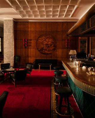 rich fabrics and deep colours at bar of Hotel Mediterraneo in Rome
