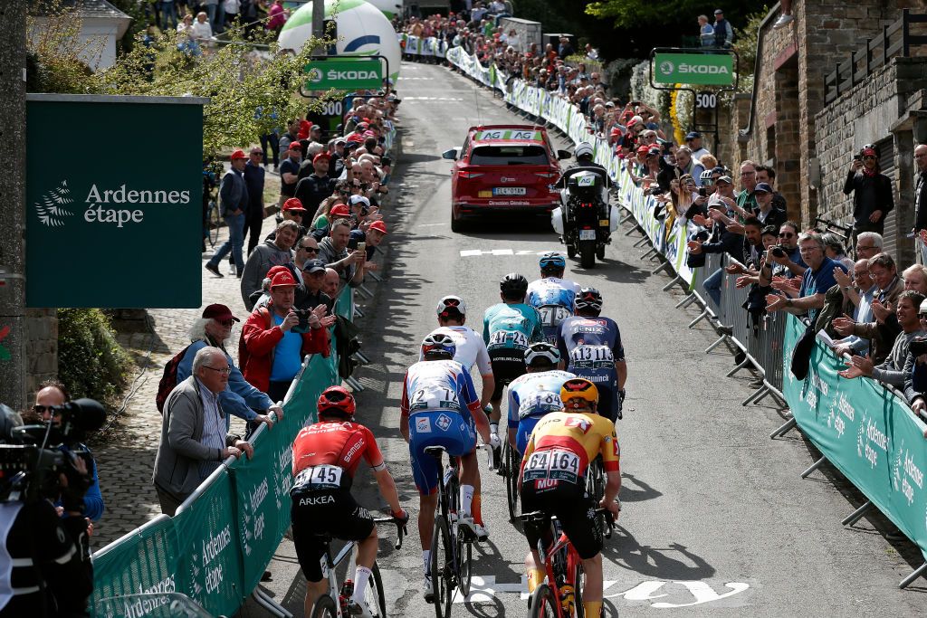 HUY BELGIUM APRIL 20 Simon Guglielmi of France and Team Arka Samsic Bruno Armirail of France and Team Groupama FDJ Christopher Juul Jensen of Denmark and Team Bikeexchange Jayco Pierre Rolland of France and Team BB Hotels PB KTM Daryl Impey of South Africa and Team Israel Premier Tech Jimmy Janssens of Belgium and Team AlpecinFenix Valentin Ferron of France and Team Total Energies and Morten Alexander Hulgaard of Denmark and UNO X Pro Cycling Team compete in the breakaway passing through the Wall of Geraardsbergen Mur de Huy 204m during the 86th La Flche Wallonne 2022 Mens Elite a 2011km one day race from Blegny to Mur de Huy 204m WorldTour FlecheWallonne on April 20 2022 in Huy Belgium Photo by Bas CzerwinskiGetty Images