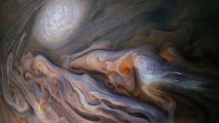 A multitude of swirling clouds in Jupiter's dynamic North Temperate Belt is captured in this image from NASA's Juno spacecraft.
