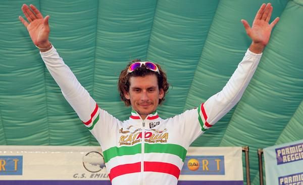 Filippo Pozzato (Katusha) celebrates his win on the podium.