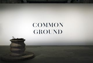 White screen with the texts 'Common Ground' written in black text
