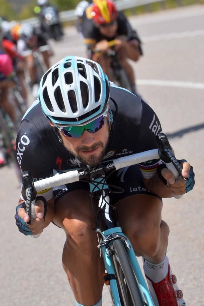 Tom Boonen (Omega Pharma-Quick Step) gets right overt his bars