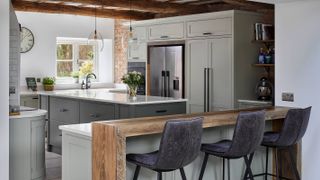 grey kitchen with raised breakfast bar