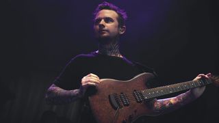 Jason Richardson with his signature Ernie Ball Music Man Cutlass